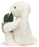 CREAM BUNNY WITH PLANT
