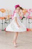 TIED IN LOVE SHORT SLEEVE POCKET TWIRL DRESS