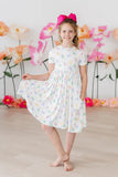 TIED IN LOVE SHORT SLEEVE POCKET TWIRL DRESS