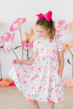 ROSETTES SHORTSLEEVE POCKET TWIRL DRESS