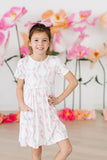 ROSIE POSIE SHORTSLEEVE POCKET TWIRL DRESS
