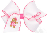 MEDIUM HAIR BOW WITH MOONSTITCH EDGE AND PINK GINGERBREAD EMBROIDERY
