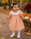 DRESS WITH SMOCKED COLLAR AND BULLION PUMPKINS